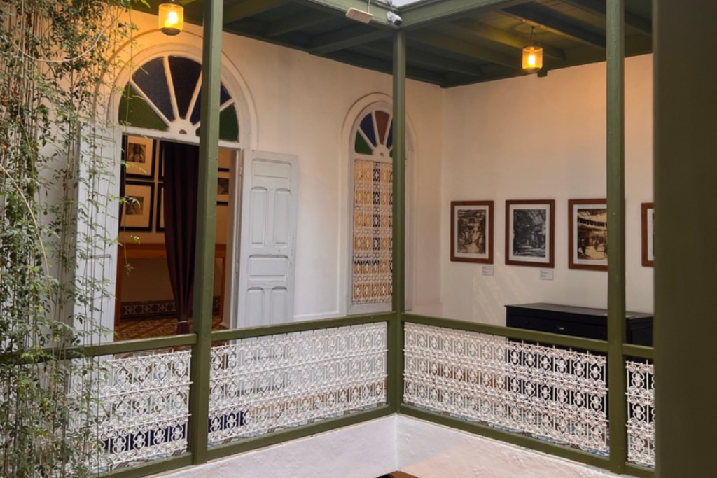Interior upper floor balcony and decorative railing inside a traditional Moroccan riad