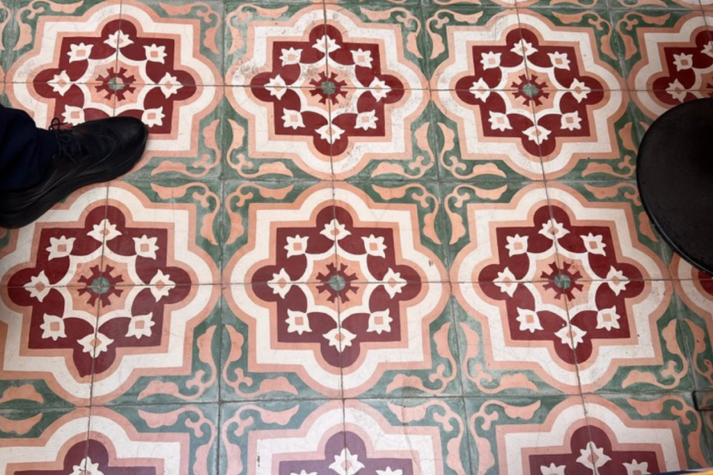 Traditional handmade Moroccan zellige ceramic floor tiles inside a riad